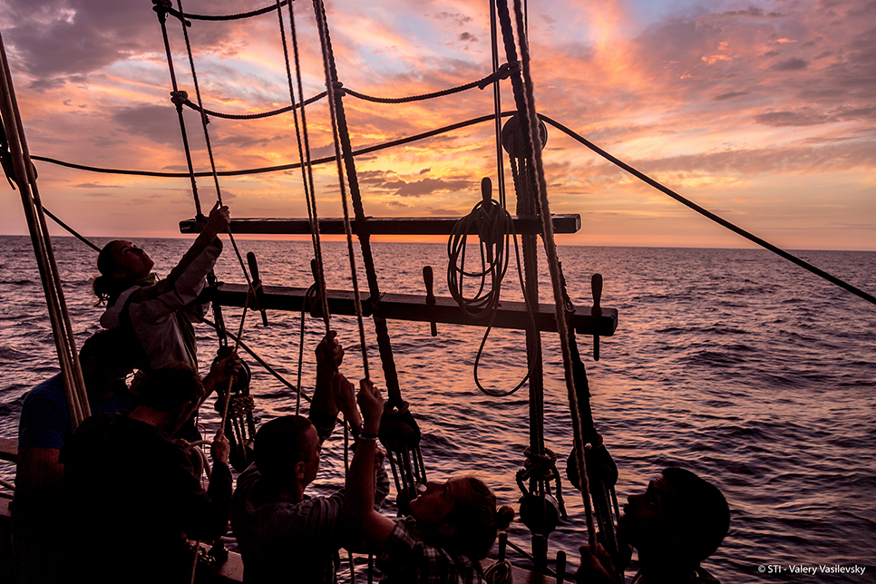 tall ship atyla sunset at sea